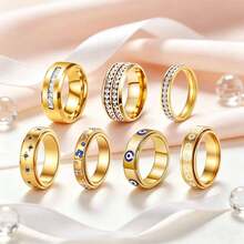 Bộ 7 chiếc nhẫn xoay được bằng thép không gỉ mạ vàng, đính đá Zirconia, chống trầy xước, không phai màu, phong cách sang trọng, phù hợp để đeo hàng ngày, dự tiệc, hẹn hò, cưới hỏi, làm quà tặng. - Bộ bảy món - Xem 3