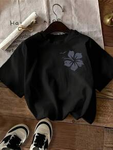 A Women's T-Shirt Design Featuring Light Blue Five-Petaled Flowers And Small Leaves On The Right Side, With A Round Neck. It's Elegant And Easy To Match, Making It A Perfect Gift For Someone Special. - 黑色 - 查看 1