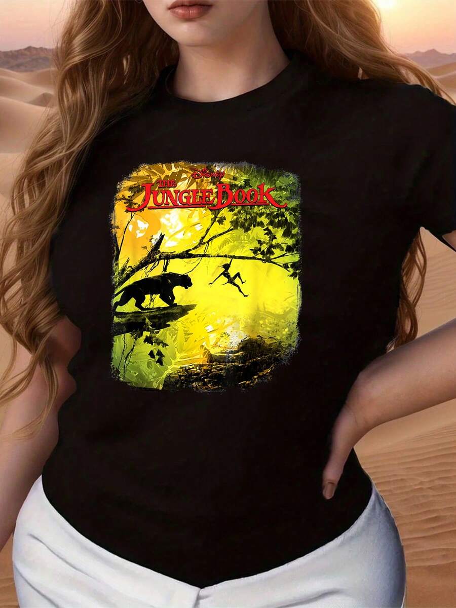 Vibrant Jungle Adventure Scene With A Child Swinging Between Trees And A Majestic Animal Symbolizing Freedom And Connection With Nature. Comfortable Women's T-Shirt For Everyday Wear Made Of Soft And Breathable Fabric. - 黑色 - 查看 1