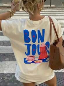 Camiseta holgada de manga corta para mujer con cuello redondo y estampado con eslogan, nueva y casual para el verano, adecuada para uso diario y vacaciones. - Albaricoque - Ver 1