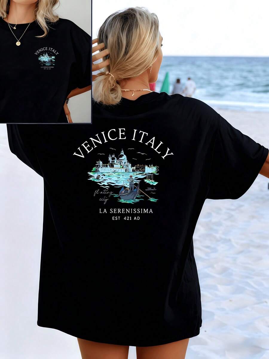 Seascape With A Gondola Sailing Through Calm Waters In Front Of The Historic Buildings Of Venice, Evoking The Serenity Of Summer. Women's T-Shirt With A Stylish And Comfortable Double Print. - 黑色 - 查看 1