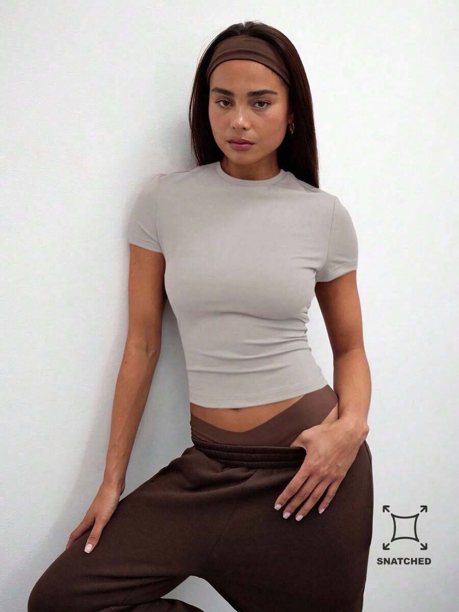 Camiseta casual de manga corta con cintura ceñida, parte de un armario cápsula para uso diario, aeropuerto, vacaciones, vuelta al colegio, elegante para primavera y verano - Albaricoque - Ver 1