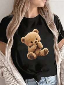 100% Cotton. A Stylish T-Shirt Suitable For All Seasons, Specially Designed For Plus-Size Women, With An Adorable Teddy Bear Print. The Pattern Design Includes The Teddy Bear's Face And Heart-Shaped Paws. This Casual Shirt Has A Round Neck And Short Sleeves. - 黑色 - 查看 7