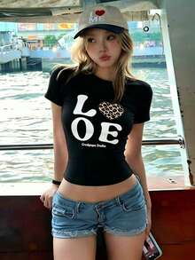 Playera crop para mujer cuello redondo manga corta, modelo nuevo verano con estampado de leopardo y letras.Corte ajustado súper padre, estilo chica trendy blanco muy versátil.Tela fresca y cómoda, perfecta para salidas, looks juveniles y combinar con jeans y falda, estilo moderno que está totalmente de moda. NDJL - Negro - Ver 6