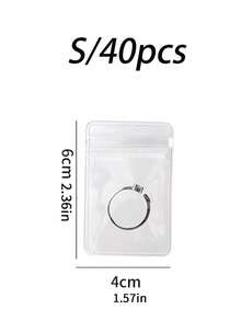 20个/40个/100个装优质PVC透明抗氧化拉链袋，46号塑料袋，非常适合存放珠宝、戒指、耳环和配饰，包含2个时尚桌面收纳盒，多功能桌面整理盒，是阳光旅行、返校必备品、节日送礼、圣诞节、感恩节、新年和情人节庆祝活动的理想之选。 - 無色 - 查看 12