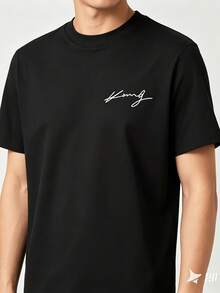 Men's Black Short-Sleeved T-Shirt, Round Neck, With A Small White Cursive Kong Logo On The Chest, Slightly Fitted Cut, Relaxed Arms, Plain Light Background With Dark Color Contrast, Casual Style For Everyday And Urban Use, Ideal As A Gift. - 黑色 - 查看 1