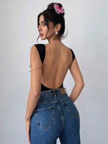 Body de unicolor con escote pronunciado y espalda descubierta, sexy y versátil para vacaciones y fiestas - Negro - Ver 1