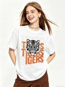 Camiseta de manga corta con cuello redondo suave y casual para mujer de verano | Estilo Americano Simple, TIGRES | Tops para salir, Estilo callejero europeo y americano, Casual deportivo, Estilo unisex, Estilo casual urbano, Tops bonitos, Generación Z, Curvas, Ropa Y2K, Camisetas divertidas, Tops de mujer, Conjuntos de vacaciones para mujer, Top lindo, Camiseta gráfica, Conjuntos de primavera, Camisetas holgadas, Ropa urbana retro, Estilo de los 90, Estilo de los 2000, Subcultura, Top negro, Tops blancos, Conjunto de fiesta de los 90. - Blanco - Ver 5