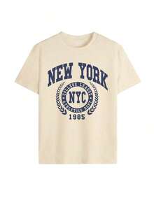 Camia de corte holgado con estampado del escudo deportivo "NEW YORK NYC", estilo universitario retro Y2K, ropa urbana, top casual de deporte de ciudad para verano, camia con lema vintage de campus para uso diario, diseño único unisex Ideal para regalar. Camisetas para mujer, camisetas para hombre, camisas > Elegantes. Estilo bohemio. Blusas suaves, transpirables y cómodas para mujer, ideales para primavera, verano y otoño, perfectas para vacaciones, viajes y uso diario, y para ver partidos. - Albaricoque - Ver 3