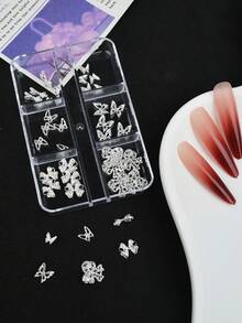 全新系列 6 格收納盒裝，共 30 件銀色蝴蝶結主題美甲配件與 3D 裝飾，融合 Y2K 「辣妹風」、公主與仙女美學，可用於美甲裝飾迷人蝴蝶圖案，非常適合 DIY 手作、手工藝及打造可愛裝飾美甲設計，美甲飾品 - 銀色 - 查看 5