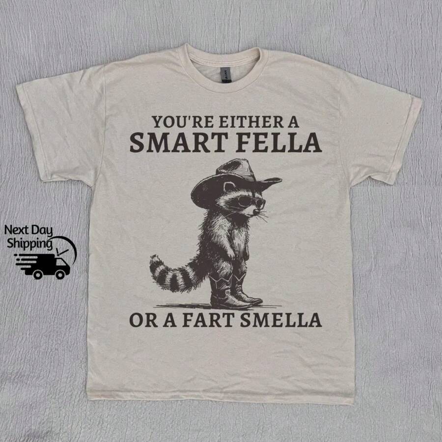 1 Piece, "Smart Guy" Raccoon Print T-Shirt, Western Humor, Couple Set S-3XL, Unisex, Urban Fashion, Summer Casual, Elegant Style For Women, Cotton Crew Neck T-Shirt, Everyday Wear | Perfect Holiday Gift | 100% Cotton Fabric | Soft And Comfortable | Crew Neck T-Shirt | - 杏色 - 查看 1