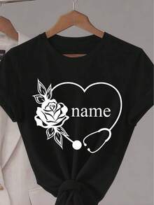 Camiseta Personalizada con Nombre, Corazón de Rosa y Estetoscopio| Cuello Redondo de Verano, Tela Ligeramente Elástica, Ideal Para Mujeres - Negro - Ver 1