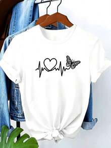 Camiseta Casual [Camiseta con Corazón Talla Grande] Talla Grande - Camiseta Estampada con Patrón de Corazón para Mujer, Estilo Nuevo y Moderno 2026 - Ropa Elegante y Cómoda para Mujer en Primavera, Verano y Otoño - Popular en Europa y América - Camiseta Casual de Manga Corta con Cuello Redondo y Estampado Gráfico - Camisetas Gráficas Occidentales - Ropa para Hombre - Camisas para Hombre - Camisetas Gráficas - Ropa para Mujer - Tops de Verano - Ropa de Verano 100% Algodón - Duradera - Blanco - Ver 1