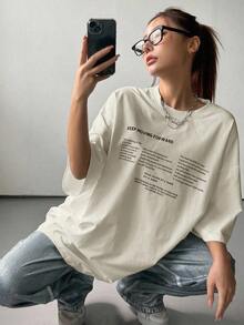 Camiseta de verano para mujer de corte holgado con cuello redondo y manga corta con estampado de eslogan "KEEP MOVING FORWARD", camiseta oversize con estampado gráfico - Albaricoque - Ver 6