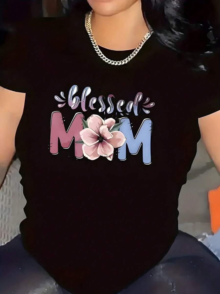 Camiseta de manga corta para mujer, con estampado de letras temáticas "Blessed Mom", decorado con flores entre las letras, diseño de letras manuscritas degradadas, cuello redondo. - Negro - Ver 1