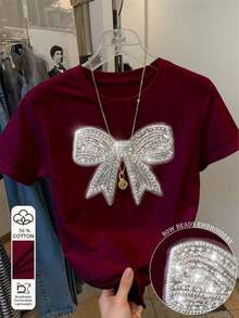 Camiseta de mujer de manga corta y cuello redondo con bordado de lentejuelas en forma de lazo, 56% algodón, estilo minimalista de moda, regalo para amigos - Burdeos 3 - Ver 5