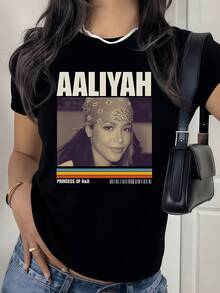 Retrato artístico con letras grandes y líneas de colores que transmite fuerza libertad y estilo urbano moderno en una camiseta de mujer casual cómoda para uso diario - Negro - Ver 1
