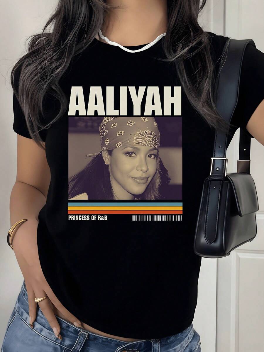 Retrato artístico con letras grandes y líneas de colores que transmite fuerza libertad y estilo urbano moderno en una camiseta de mujer casual cómoda para uso diario - Negro - Ver 1