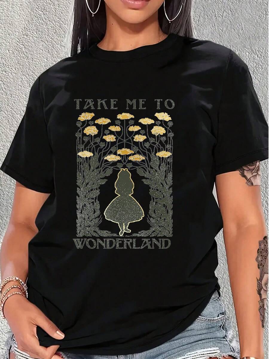 Figura de una chica frente a flores doradas simboliza curiosidad y la búsqueda de mundos mágicos donde la imaginación florece entre la naturaleza encantada camiseta de mujer cómoda y moderna para uso diario - Negro - Ver 1