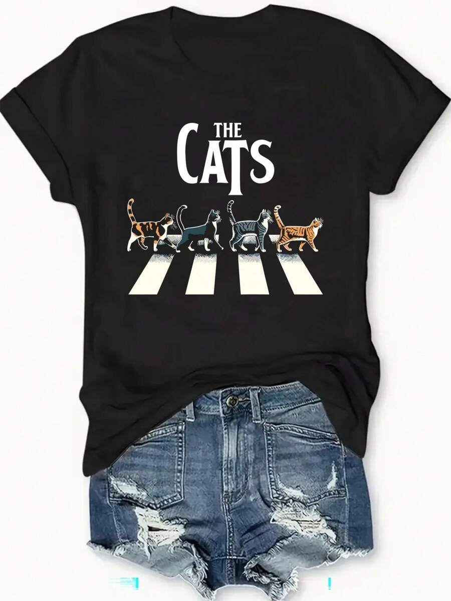 Women's Casual T-Shirt With Crossing Cat Graphic - Soft And Breathable Fabric, Fun THE CATS Lettering And Cartoon Cats On Zebra Print Road Design, Black And White Crew Neck Top, Machine Washable For Spring Summer Casual Wear, Cat T-Shirt, Spring Summer Set, Whimsical Style, Comfortable Fit, Printed T-Shirt, Fashion Followers, Spring Fashion, Durable Material, Cat Theme T-Shirt, Adults - 黑色 - 查看 1