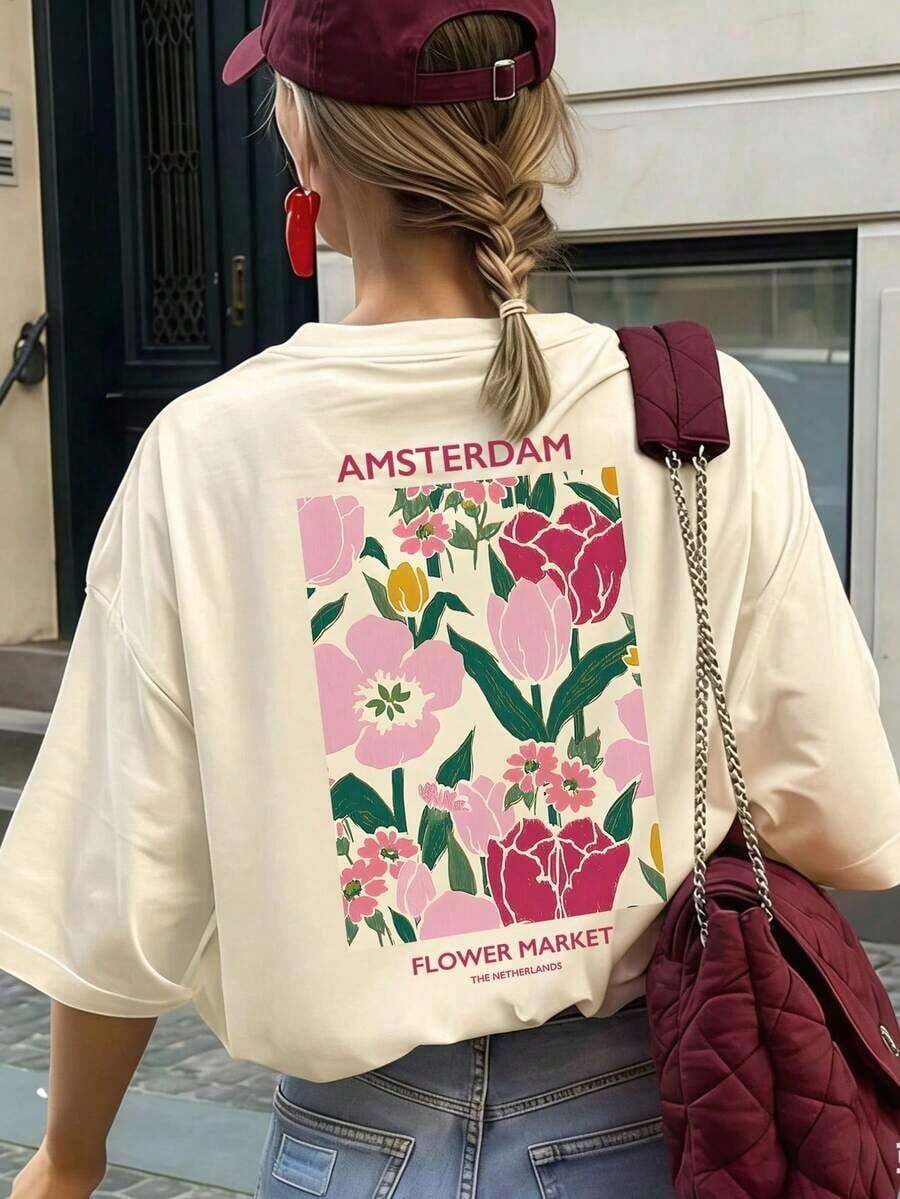 Camiseta de manga corta beige con cuello redondo, estampado floral y de letras, estilo casual, holgada y versátil para mujer, ideal para el verano y el uso diario, color blanco. - Albaricoque - Ver 1