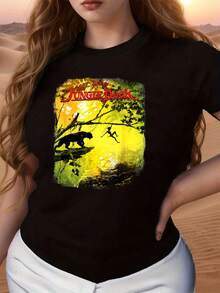 Vibrant Jungle Adventure Scene With A Child Swinging Between Trees And A Majestic Animal Symbolizing Freedom And Connection With Nature. Comfortable Women's T-Shirt For Everyday Wear Made Of Soft And Breathable Fabric. - 黑色 - 查看 6