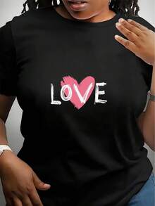 Camiseta negra de moda para mujer, talla grande, de una sola pieza, con estampado de corazón rosa y la palabra LOVE - casual, ligera, de manga corta, adecuada para todas las estaciones, lavable a máquina - regalo ideal para las fiestas. - Negro - Ver 1