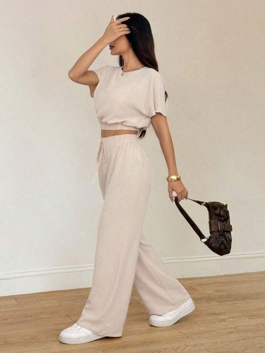 Conjunto de dos piezas con top corto de manga murciélago y pantalones con cordón en la cintura, de tela texturizada.Conjunto de dos piezas casual, cómodo y para tallas altas para mujeres. - Albaricoque - Ver 1