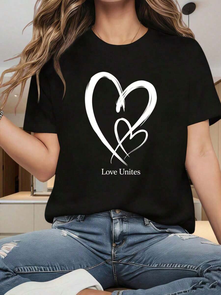 Women's Short-Sleeved Crew Neck T-Shirt With A Heart Design And The Phrase "Love Unites." A Casual, Graphic Tee. The Fun Print Is Perfect For Christmas Parties, Sports Activities, Holiday Parties, Outings, And Other Festive Gifts. A Great Summer T-Shirt. - 黑色 - 查看 1