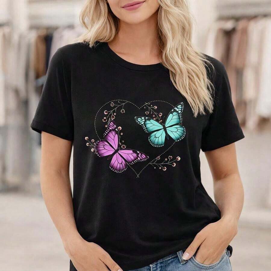Camiseta de algodón puro para mujer, talla grande M-5XL, cuello redondo, manga corta, estampado de corazón de mariposa, corte holgado informal, suave y transpirable, top básico de verano, camiseta gráfica de moda para uso diario. Adecuada para primavera, verano y otoño. - Negro - Ver 1