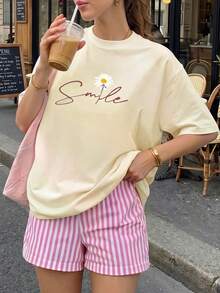 Camiseta informal de manga corta con cuello redondo y estampado de margaritas para mujer, de poliéster, de largo normal, ideal para conjuntos primaverales. - Albaricoque - Ver 2