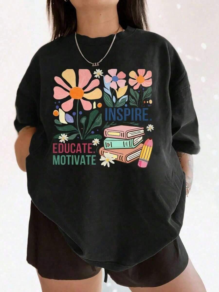 Simple And Versatile Design. This T-Shirt, Featuring A Floral Book Design, Is Designed To Encourage Education Professionals And Is An Ideal Choice For School Events And Teacher's Day. Made From Pure Cotton. - Black - View 1