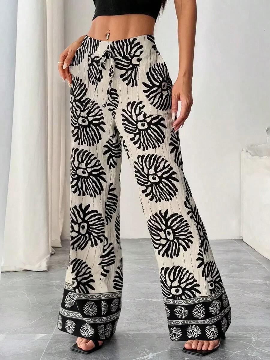 Pantalones sueltos para mujer con rayas azules de tiro bajo para vacaciones y uso informal - Multicolor - Ver 1