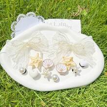 12 pezzi Accessori con fiocco in pizzo bianco, decorazioni a forma di stella marina bianca per scarpe, clip rimovibili per scarpe, fiori decorativi per scarpe fai-da-te, alla moda ed eleganti, adatti per sandali traforati, ciabatte, ottimi come regali per le vacanze - Albicocca - Visualizzare 10