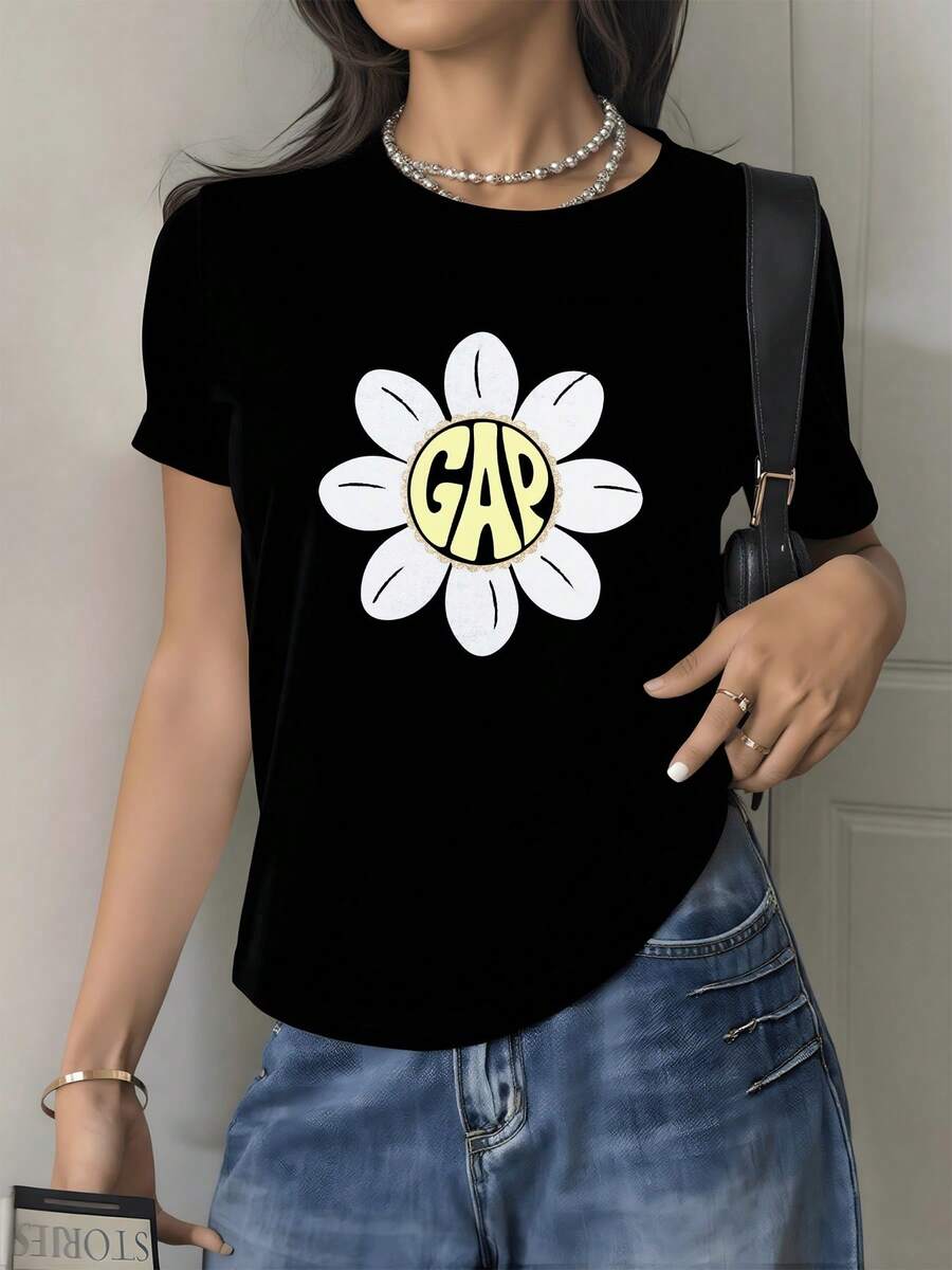 Flor grande blanca con centro amarillo que simboliza pureza energía optimismo y alegría perfecta para reflejar una actitud positiva camiseta de mujer casual moderna cómoda para verano - Negro - Ver 1