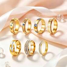 Bộ 7 chiếc nhẫn xoay được bằng thép không gỉ mạ vàng, đính đá Zirconia, chống trầy xước, không phai màu, phong cách sang trọng, phù hợp để đeo hàng ngày, dự tiệc, hẹn hò, cưới hỏi, làm quà tặng. - Bộ bảy món - Xem 4