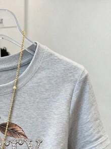 Camiseta casual de mujer de cuello redondo y manga corta con estampado digital de leopardo rosa, un regalo para amigos - Gris Claro - Ver 3