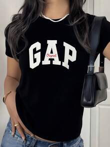 Letras grandes blancas representan fuerza y confianza con toque juvenil y moderno al centro sobre fondo oscuro creando contraste elegante camiseta de mujer casual cómoda para uso diario - Negro - Ver 1