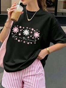 Camiseta de estilo casual para mujer, de talla grande, con estampado floral y de letras, tela suave, corte holgado, cuello redondo, mangas cortas, adecuada para primavera y verano, ideal para uso diario, combinable. - Negro - Ver 10