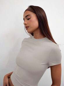 Camiseta casual de manga corta con cintura ceñida, parte de un armario cápsula para uso diario, aeropuerto, vacaciones, vuelta al colegio, elegante para primavera y verano - Albaricoque - Ver 5
