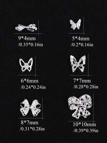 全新系列 6 格收納盒裝，共 30 件銀色蝴蝶結主題美甲配件與 3D 裝飾，融合 Y2K 「辣妹風」、公主與仙女美學，可用於美甲裝飾迷人蝴蝶圖案，非常適合 DIY 手作、手工藝及打造可愛裝飾美甲設計，美甲飾品 - 銀色 - 查看 3