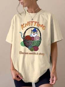 Camiseta Casual de Mujer con Diseño de "Tejido", con un Lindo Gato y una Cesta de Hilo - Perfecta para Amantes de los Animales, Uso Diario y como Regalo, Camiseta para el Día a Día |     Estampados Divertidos |     Cómoda y bien ajustada, linda camiseta de verano. Blusas para mujer. - Albaricoque - Ver 7