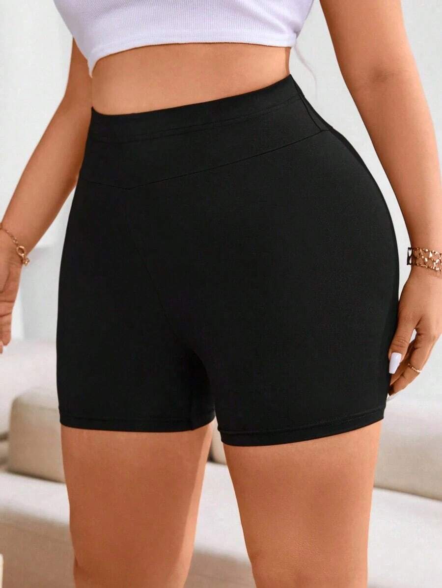 Leggings negros deportivos y de yoga con cintura elástica y levantadora de talla grande para mujeres - Negro - Ver 1