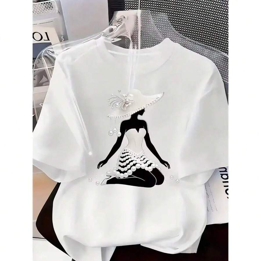 Una combinación de elegancia de alta gama y lujo discreto: una exquisita camiseta estampada, confeccionada exclusivamente para la mujer.Su diseño femenino se adorna con motivos de perlas y cristales, irradiando un refinado sentido del lujo que la convierte en la elección perfecta para el uso diario - blanco2(Patrón impreso) - Ver 1