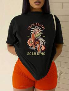 Majestic Lion Surrounded By Tropical Flowers Symbolizing Strength, Resilience, And Courage In The Face Of Life's Hardships, Conveying Wild Energy And An Indomitable Spirit. Comfortable Casual Women's T-Shirt For Everyday Wear And Walks. - 黑色 - 查看 2