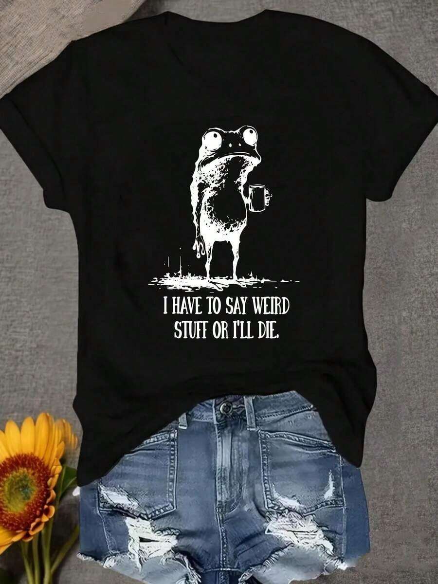 Camiseta de Mujer con Cuello Redondo, Cómoda y Suave, para Uso Diario Casual, con Diseño de Rana Sosteniendo una Taza y la Frase 'TENGO QUE DECIR COSAS RARAS O MORIRÉ'. - Negro - Ver 1