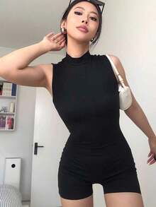 Mono casual de mujer con cremallera frontal, manga corta y cuello alto en unicolor - Negro 3 - Ver 4
