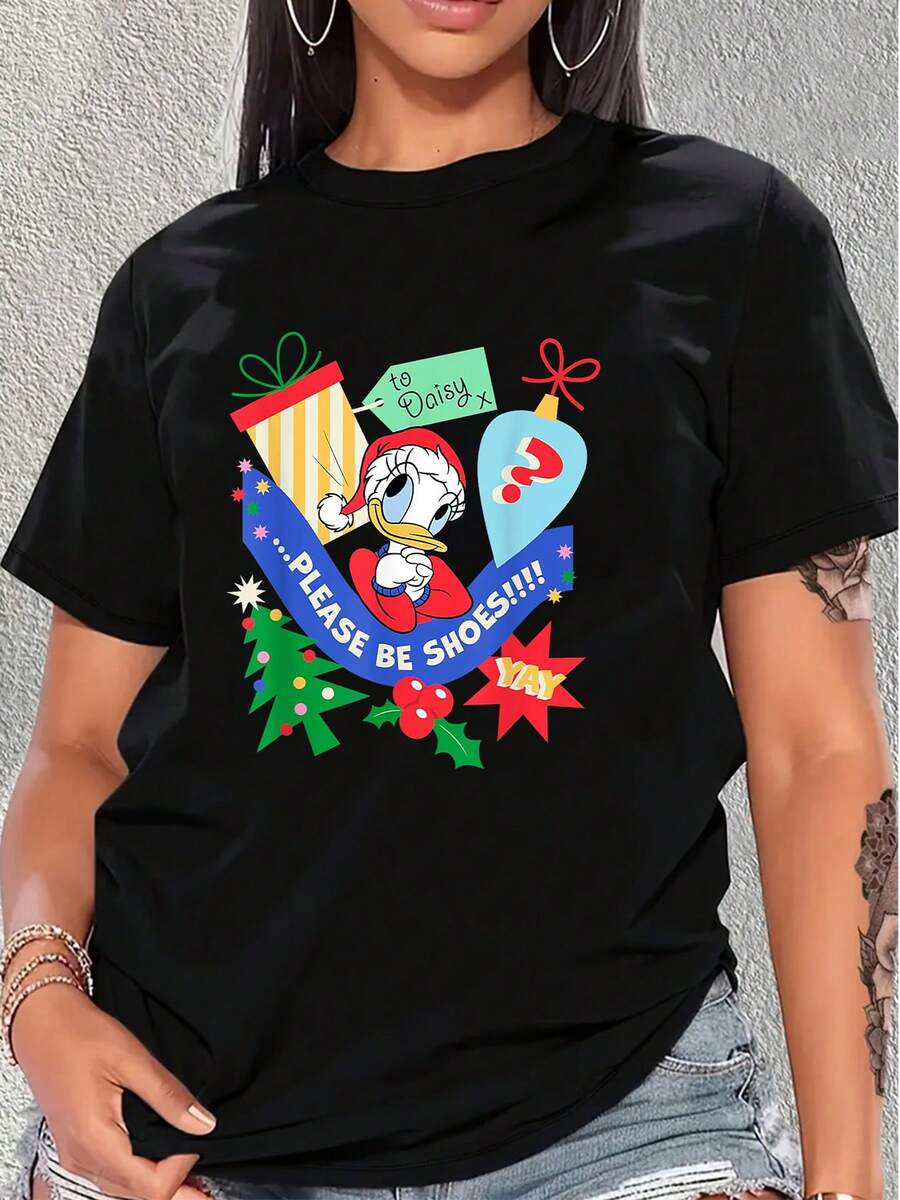 El estampado muestra un personaje femenino alegre rodeado de regalos y adornos festivos con mensaje divertido que transmite emoción por la sorpresa, perfecta para celebrar con buen humor y energía positiva, camiseta de mujer cómoda y casual para uso diario - Negro - Ver 1