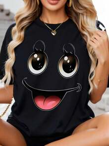 Women's Graphic T-Shirt With 3D  Face - Black, Loose Fit, Casual, Round Neck And Short Sleeve, With Cartoon Eyes And Flowers On The Lips, 100% Soft, Machine Washable, All Season Comfort, Bold And Fun Print For Daily Wear, Cheerful And Playful Face Design, Expressive Eyes And Lips, Casual Clothing, Fashion Garment, Easy Care, Bohemian Style, Knit Fabric, Positioned Print, For Weekend, Fashion For Adult Women, Relaxed Fit, Comfortable Material, Breathable Fabric, Loose And Comfortable. - Back - View 1