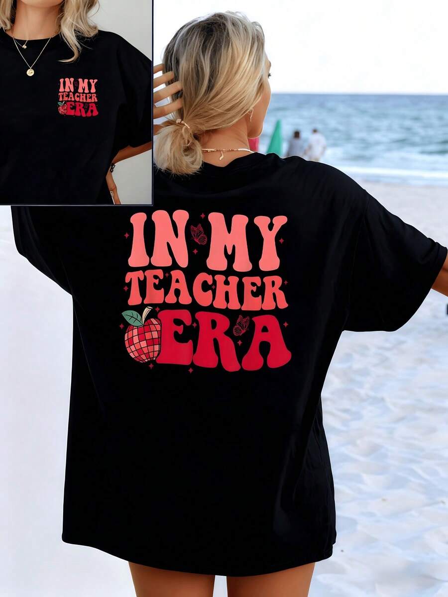 Inspirational Phrase Celebrating The Dedication Of Teachers With Apple And Butterfly Symbolizing Knowledge And Transformation. Women's T-Shirt With Double Print, Casual And Comfortable For Everyday Wear. - Black - View 1